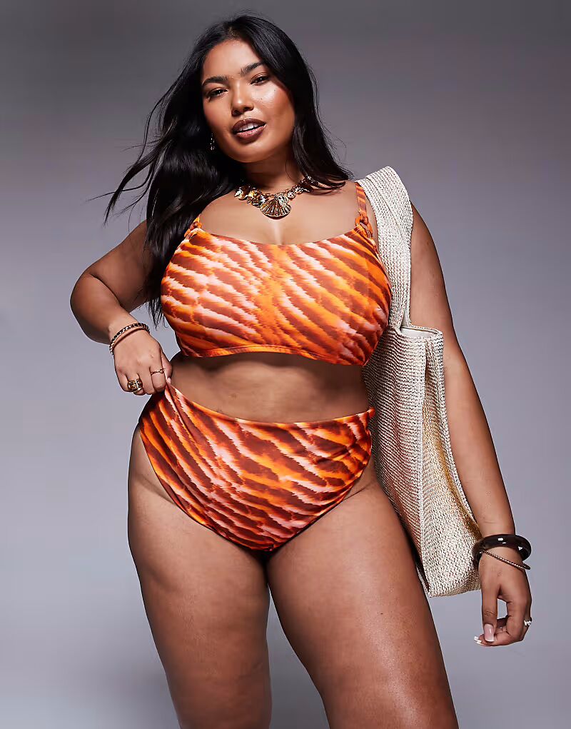 

Плавки бикини с завышенной талией ASOS DESIGN Curve Charlie с оранжевым анималистичным принтом ASOS Curve