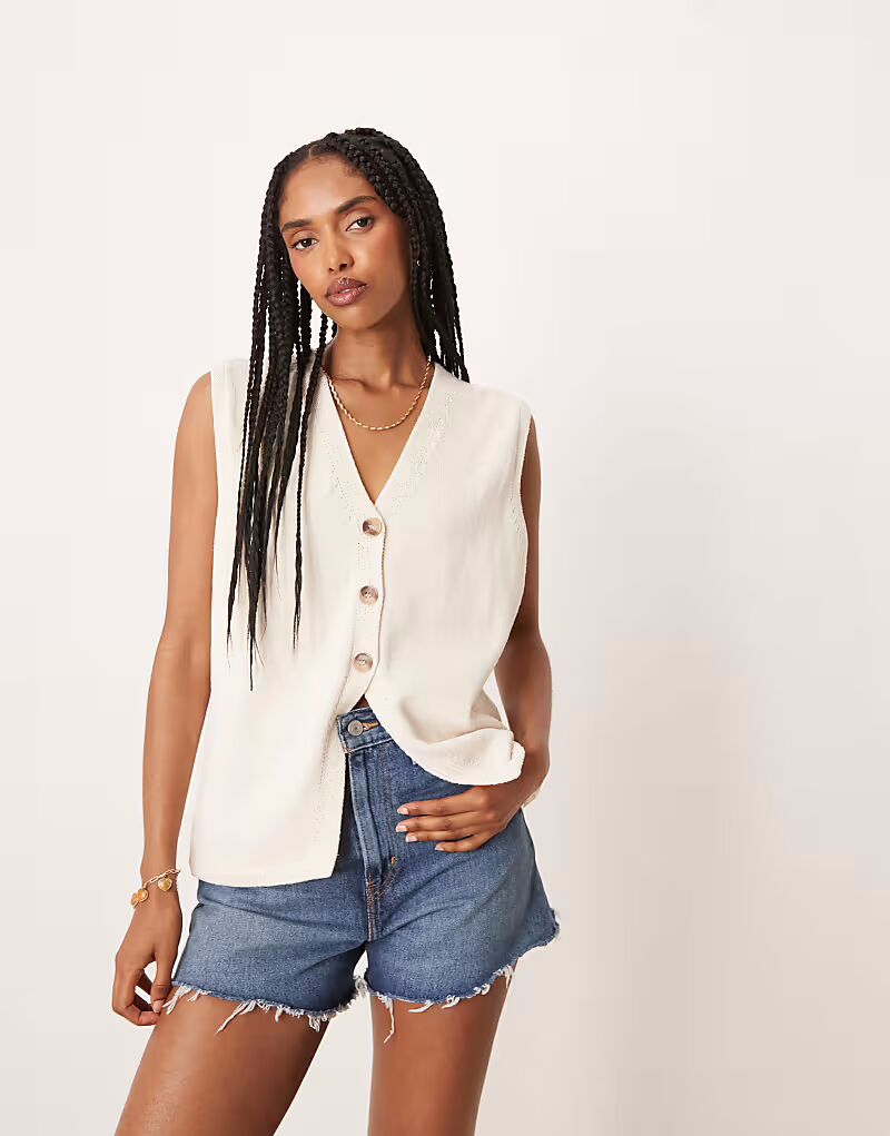 

Жилет свободного кроя ASOS DESIGN чистого трикотажа кремового цвета