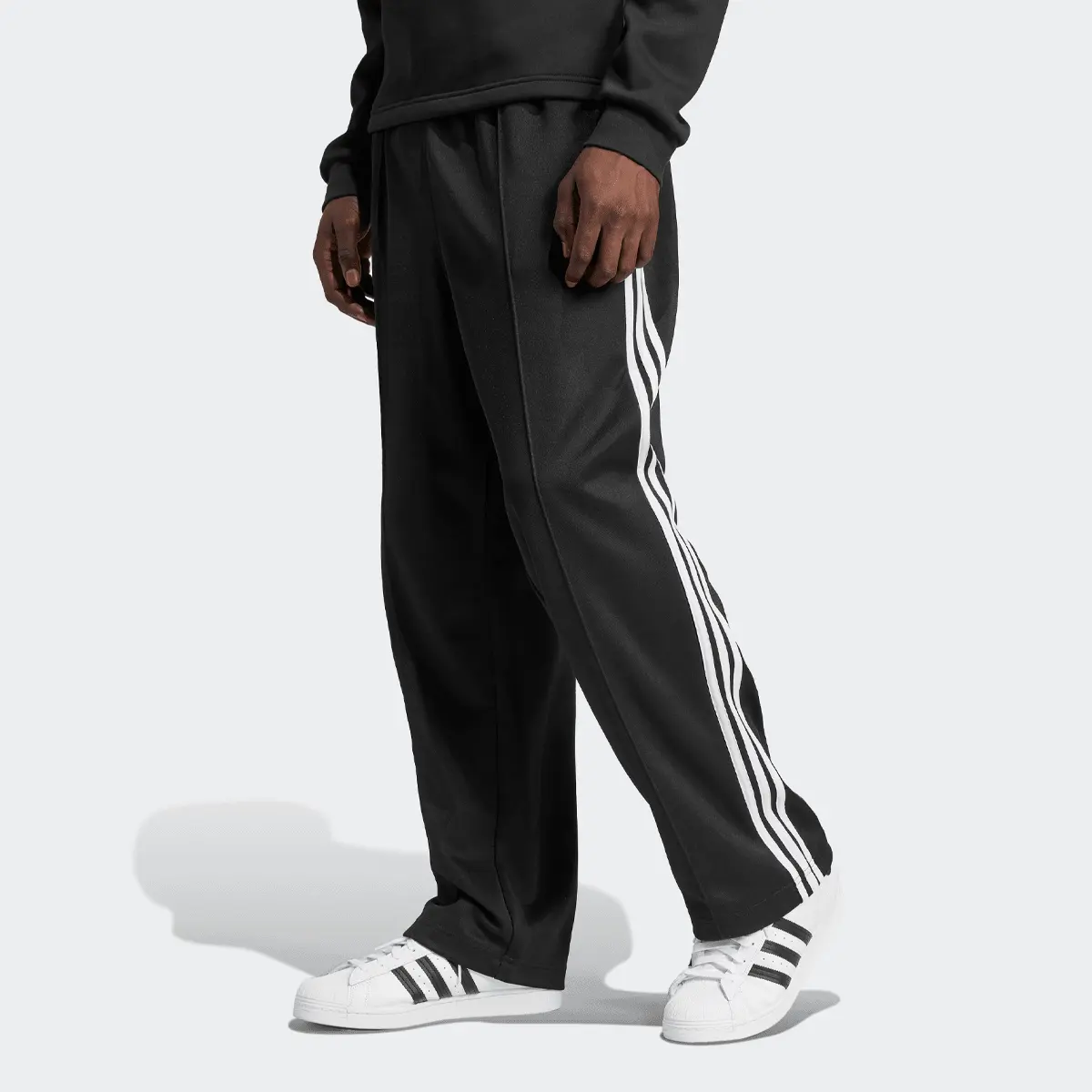 

Спортивные брюки adidas Originals Adicolor Baggy Fit Firebird Trainingshose, черно-белый