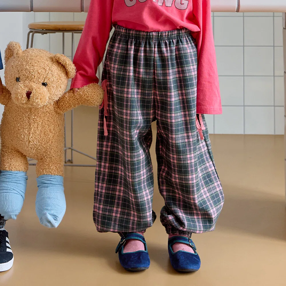 Детские брюки Matilda в клетку с бантом от Bebetailor