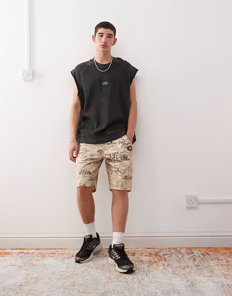 

Плотницкие шорты Aape by A Bathing Ape с принтом «родео» по всей поверхности бежевого цвета