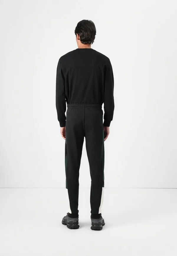 Спортивные штаны Lacoste, классические, черный — фото 3