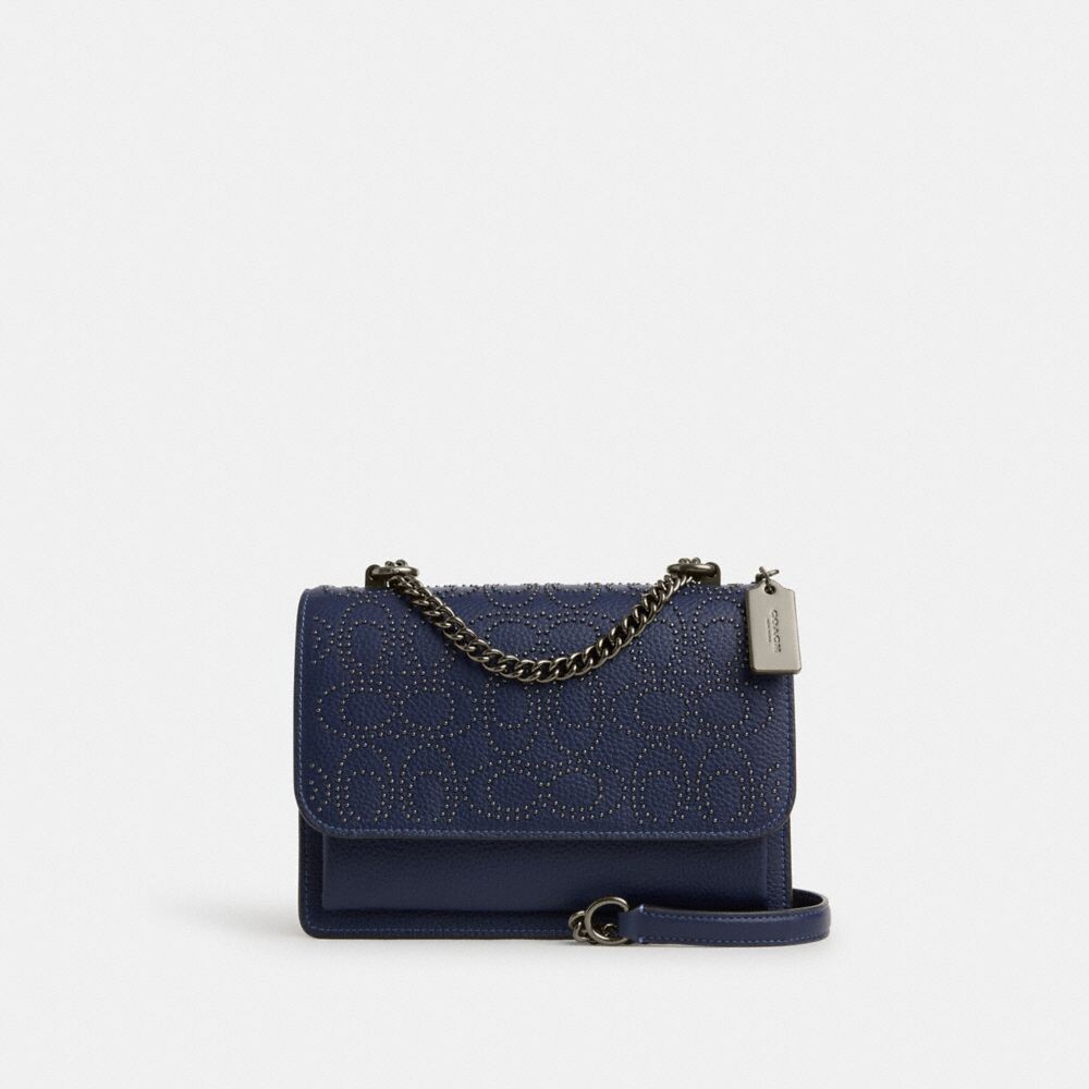 

Сумка через плечо Klare с фирменными заклепками COACH, цвет black antique nickel/true navy