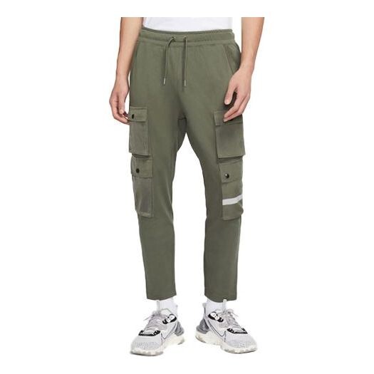 

Брюки sportswear city made multiple pockets reflective logo knit casual pants yellow Nike, желтый