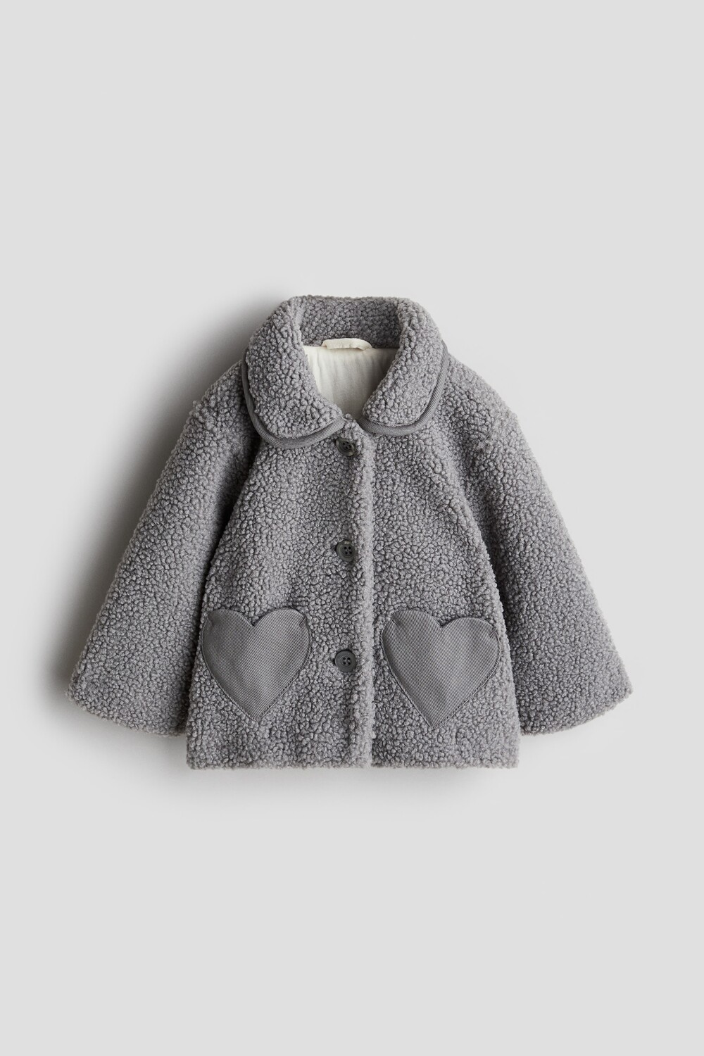 

Куртка из флиса Тедди с карманами-сердечками. H&M, серый