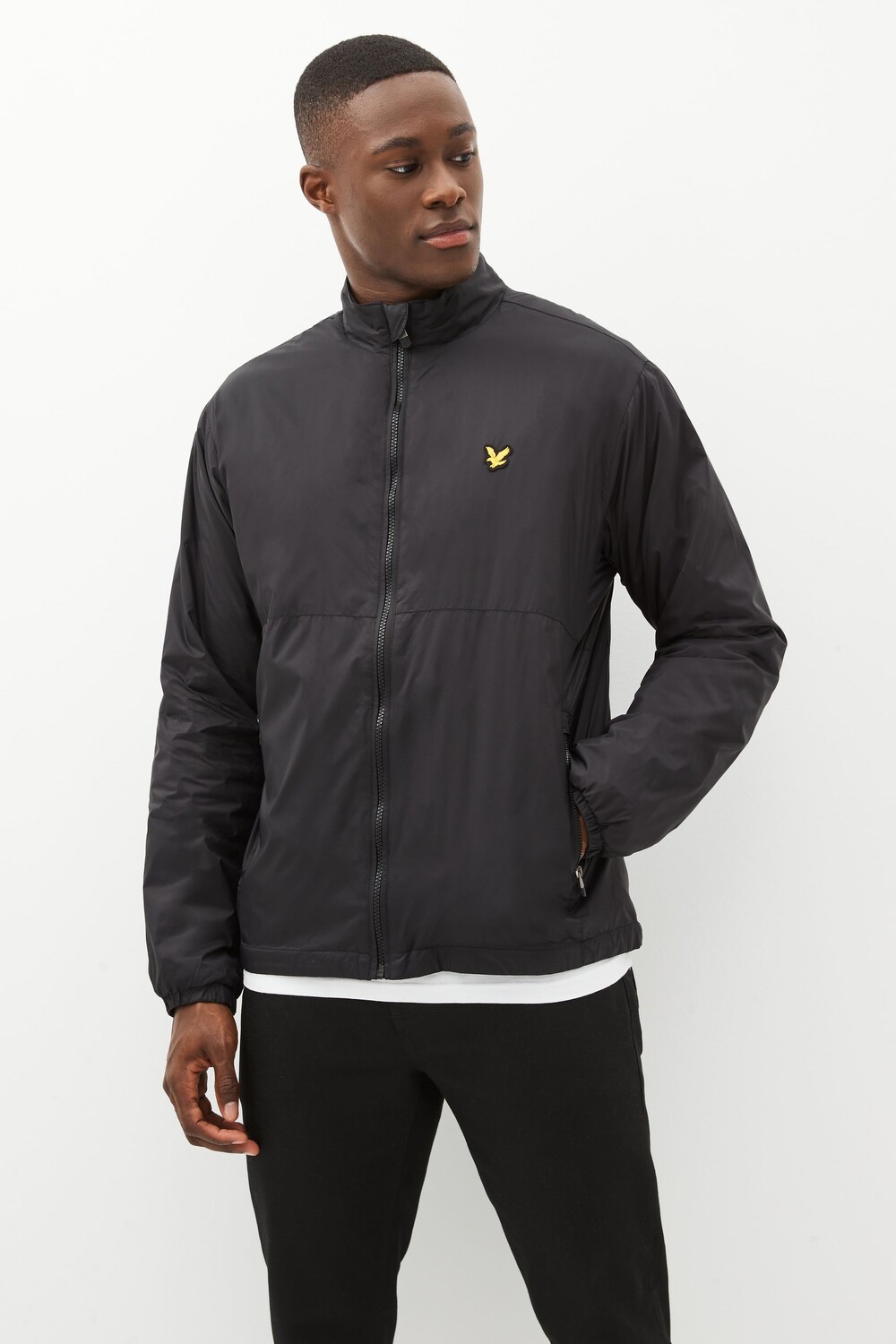 

Ветровку Golf Windjammer легко упаковать Lyle & Scott, черный