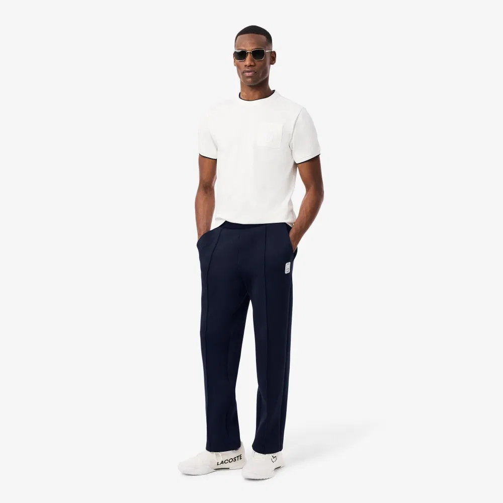 Мужские теннисные брюки Heritage тёмно-синие от Lacoste