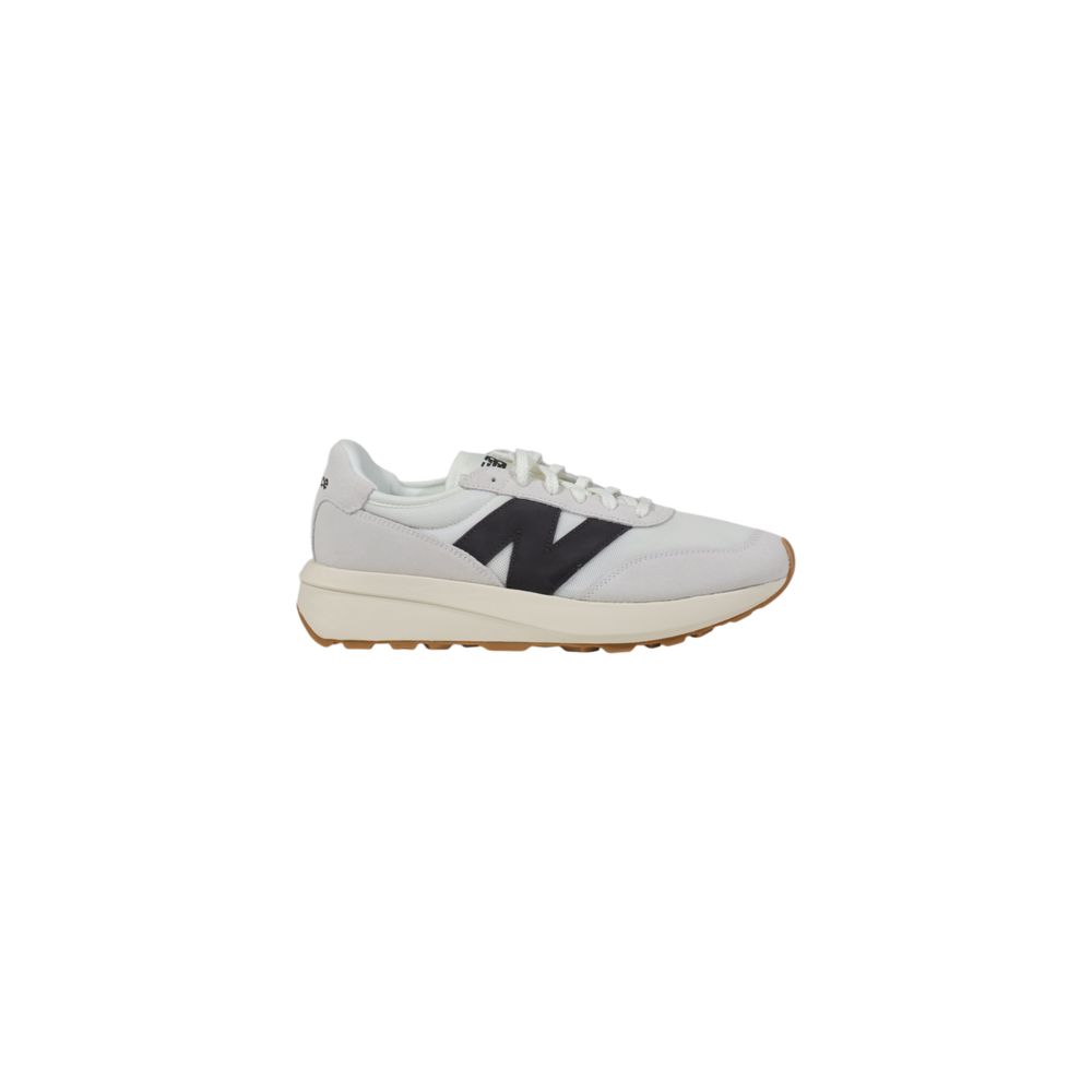 

Белые замшевые кроссовки из кожи New Balance