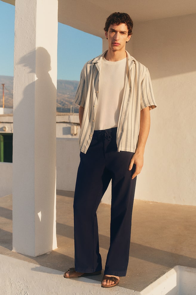 

Брюки из лиоцелловой смеси, прямого кроя. H&M, синий