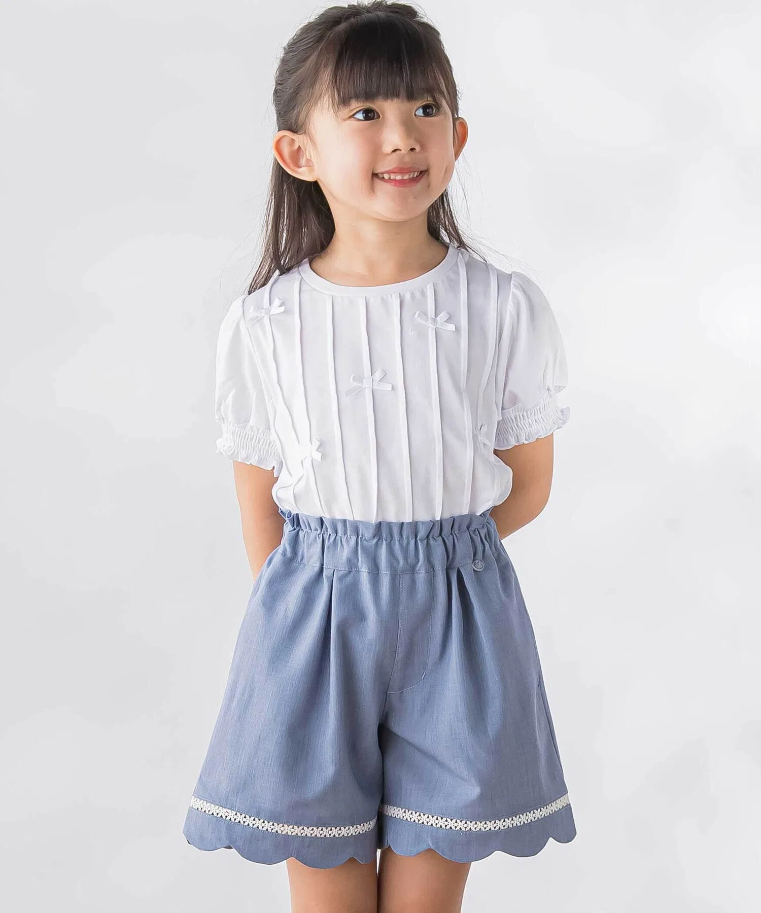 Детская футболка с бантом BeBe Petits Pois Vert чёрная — фото 3