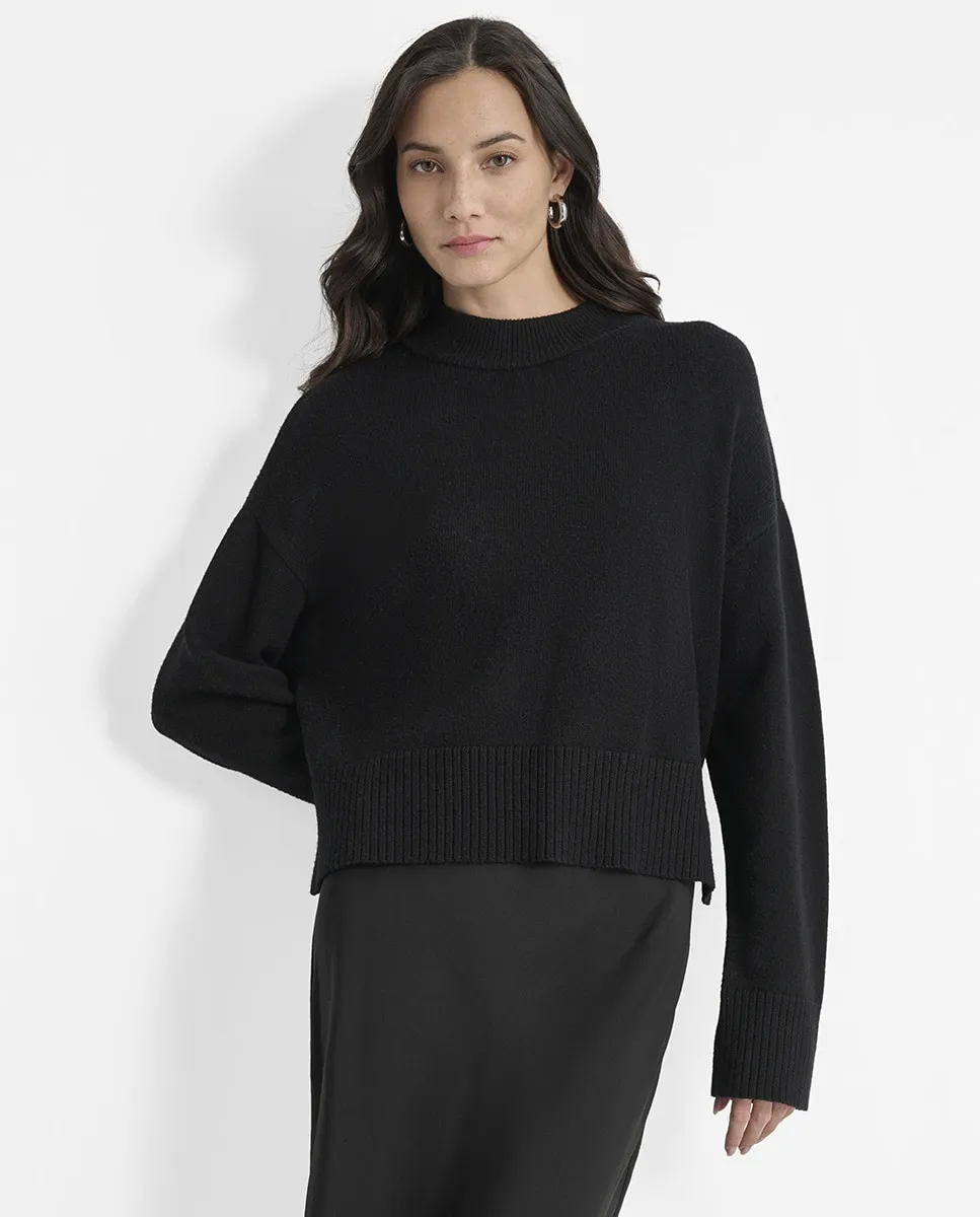 

Женский джемпер с высоким воротником и низким подолом Dkny Jeans, черный