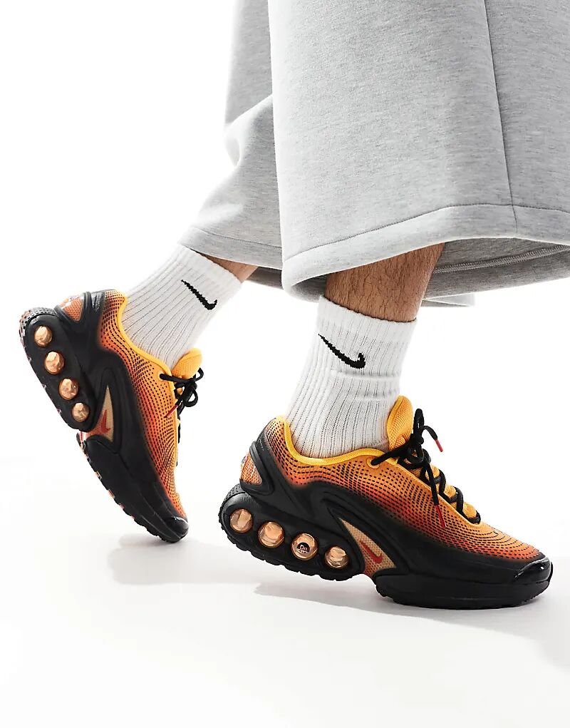 

Кроссовки Air Max DN черного и оранжевого цветов Nike