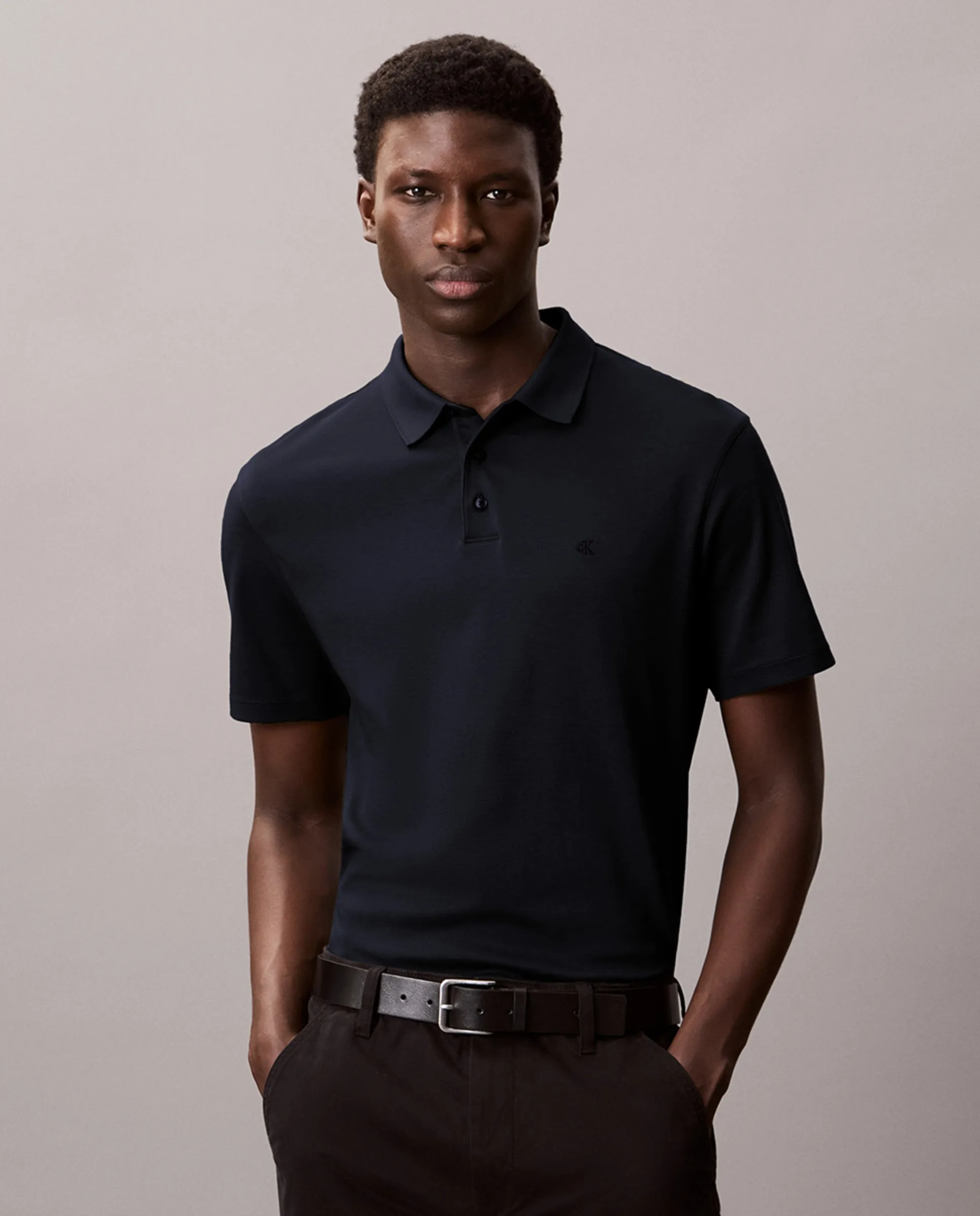 

Хлопковая футболка-поло с коротким рукавом для мужчин Calvin Klein, темно-синий