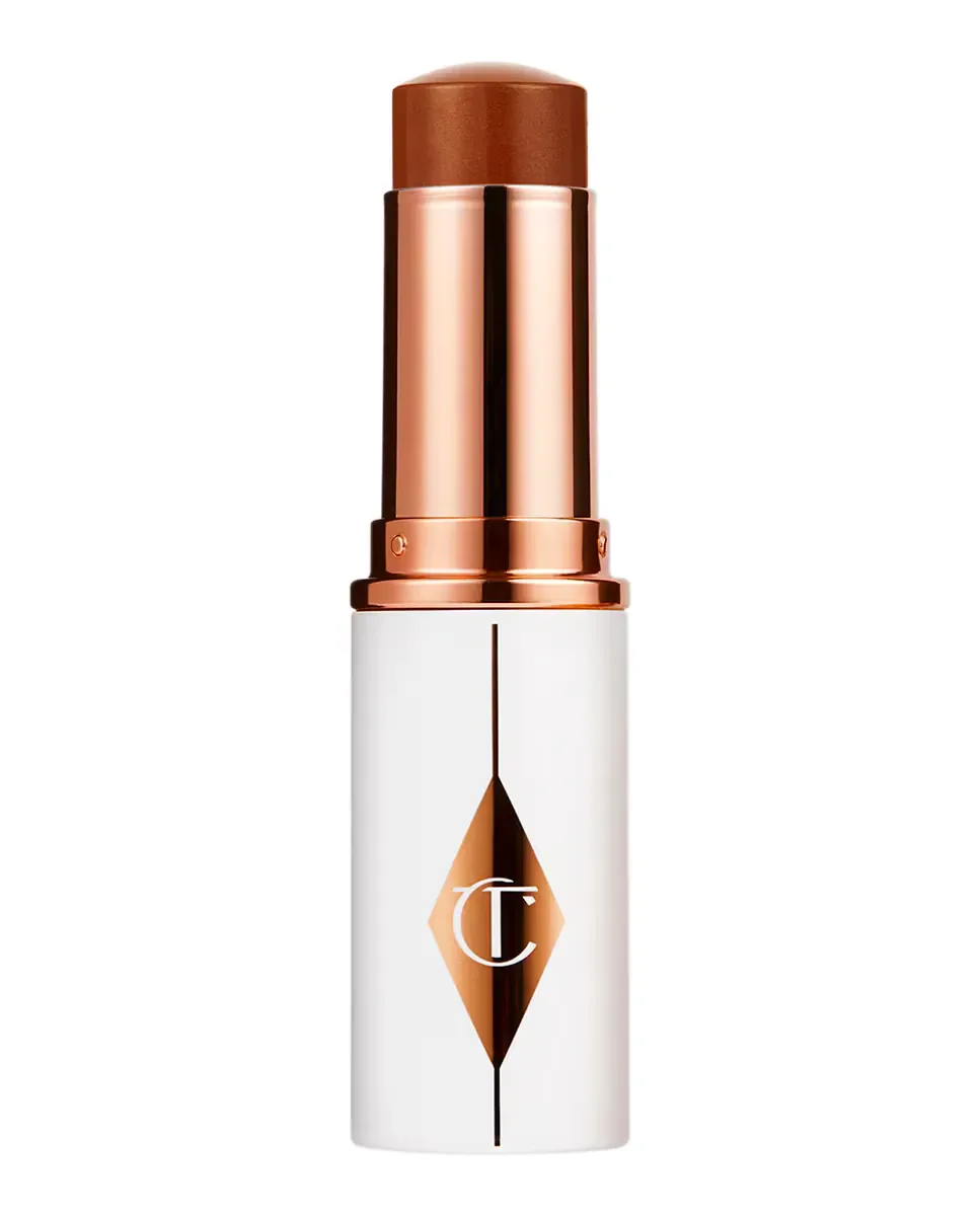 Тональная основа Unreal Skin Sheer Glow Tint-Hydrating Charlotte Tilbury, 14 Deep
