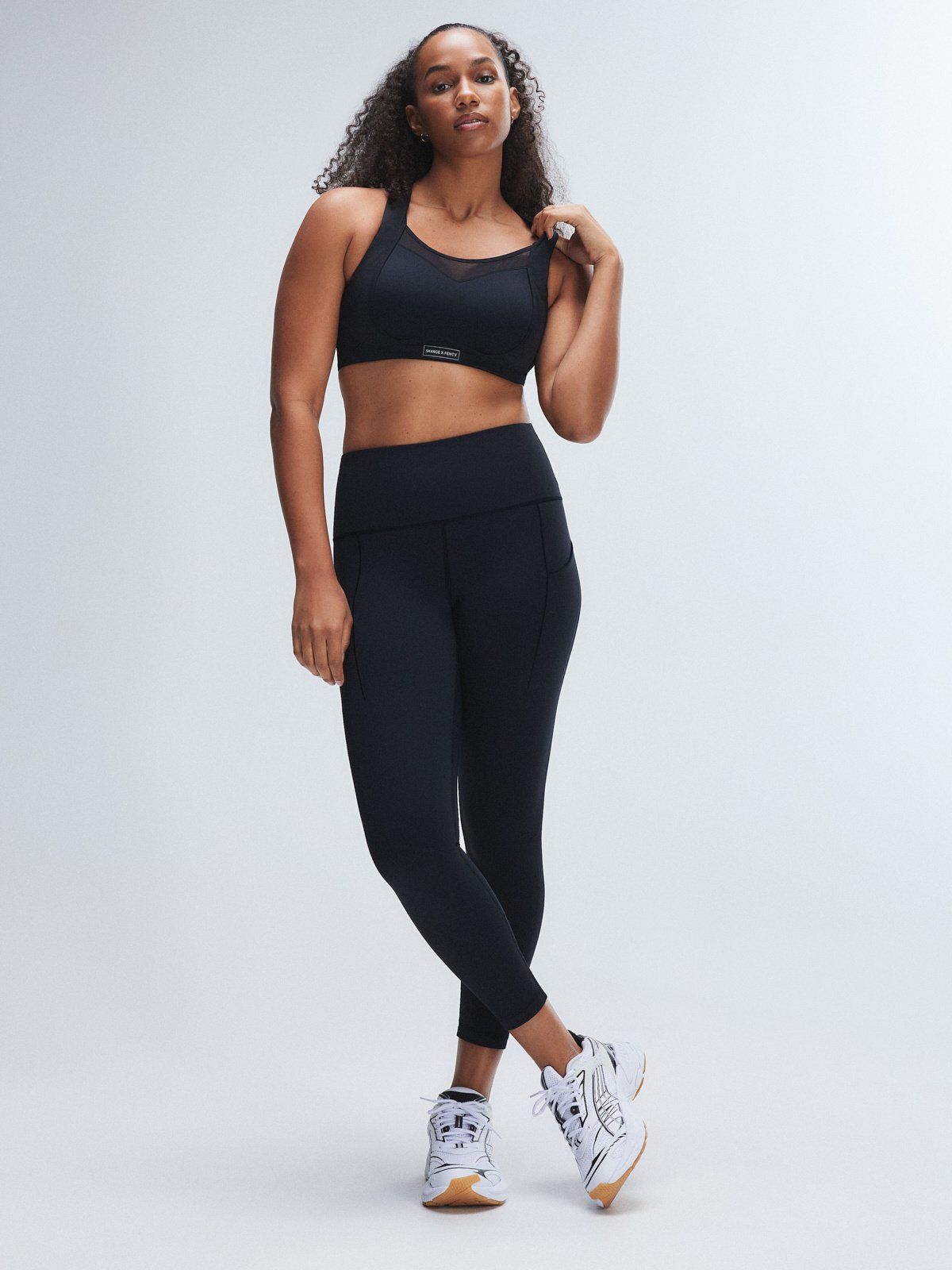 

Леггинсы Savage X Fenty Running Hot 7/8 High-Waist Side Pocket, цвет Black Caviar