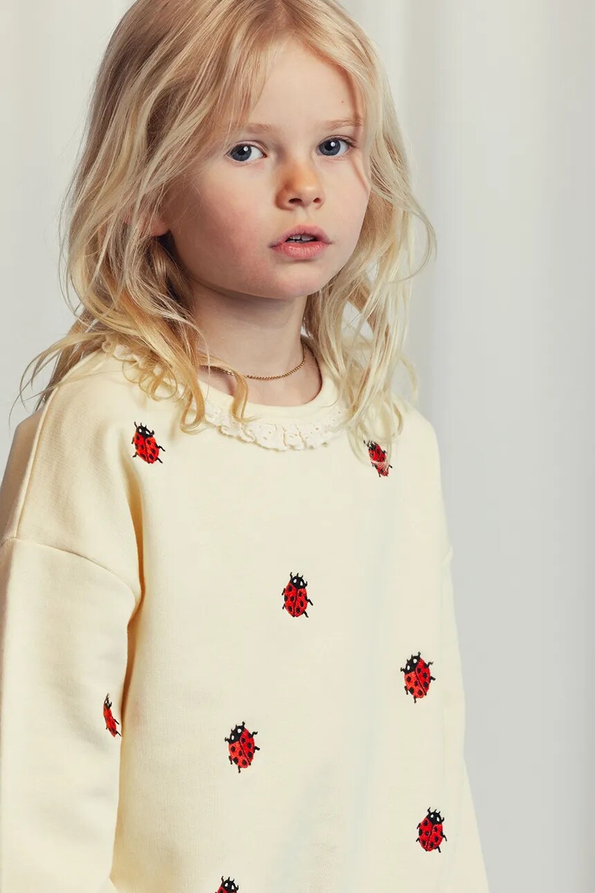 

Детская хлопковая толстовка с божьими коровками Mini Rodini, бежевый