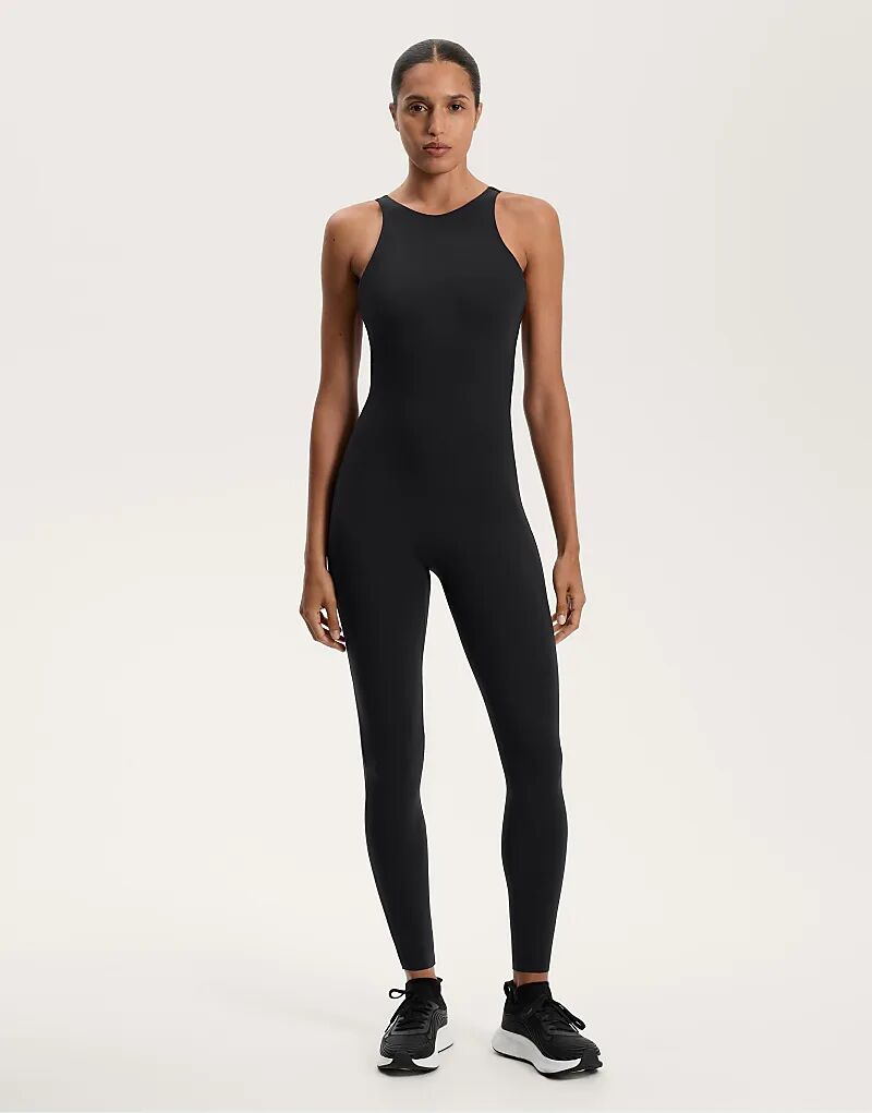 

Длинный компрессионный комбинезон OYSHO с завязками на спине черного цвета