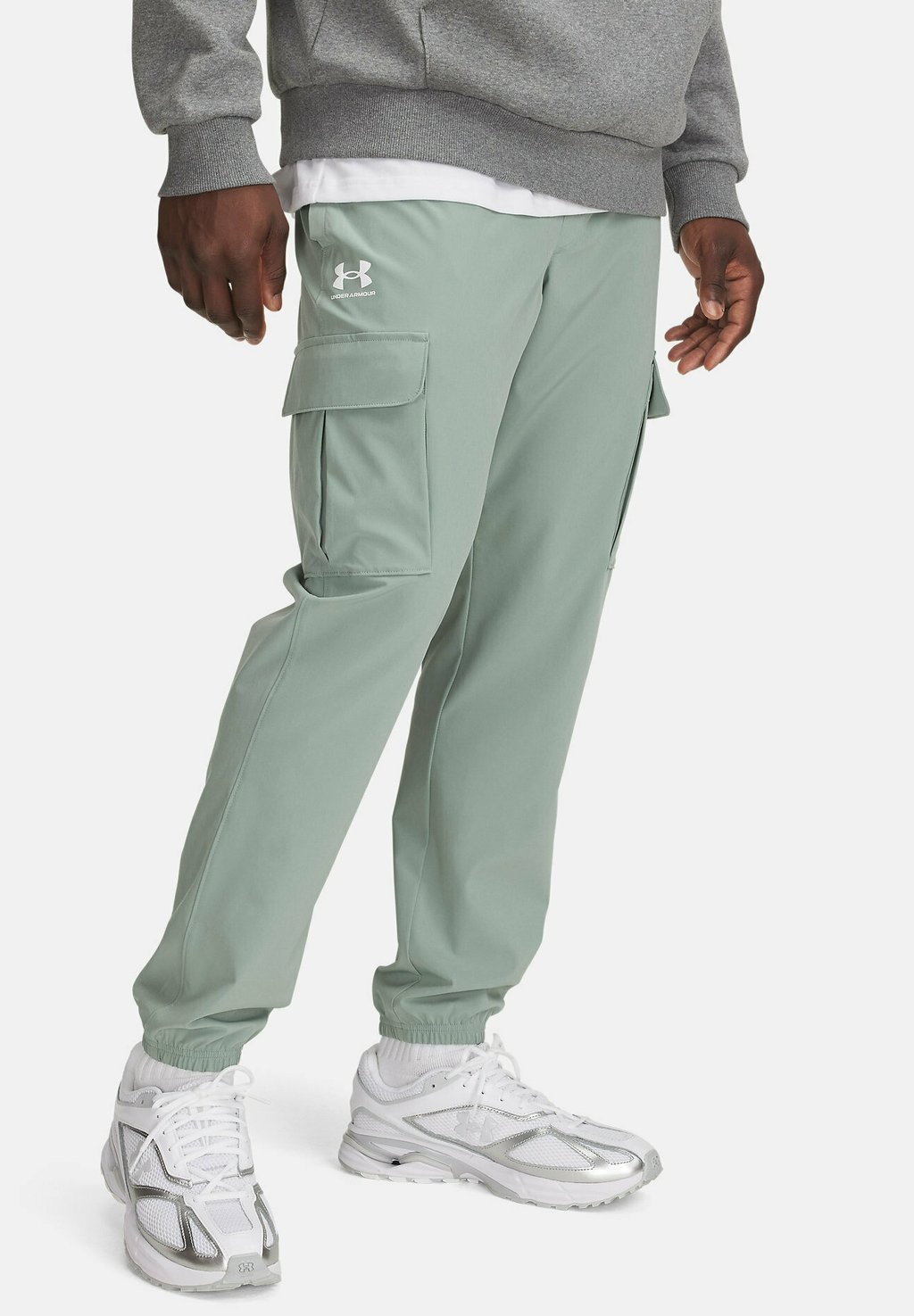 

Брюки VIBE WOVEN Under Armour, зеленый