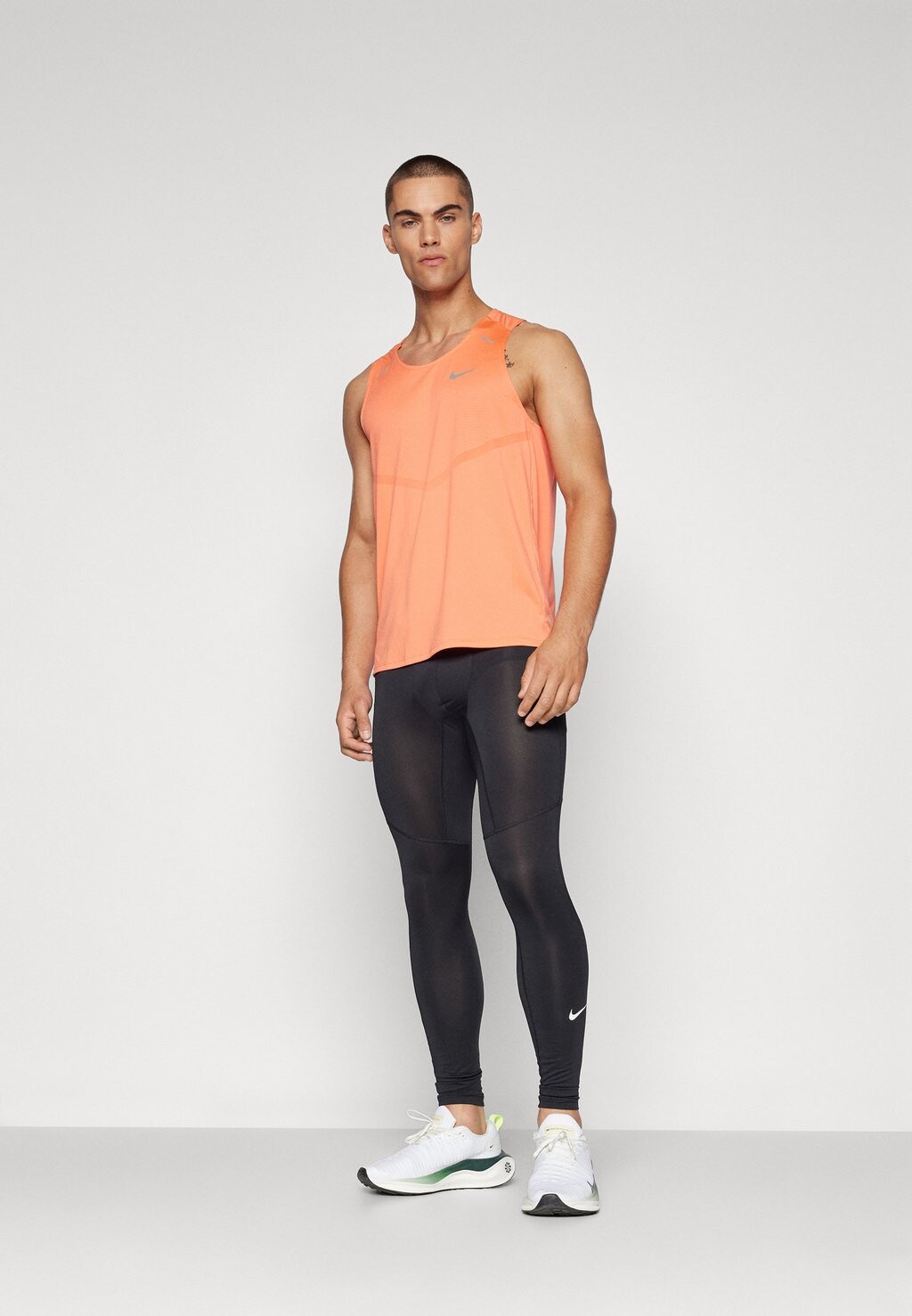 

Топ RISE TANK Nike Performance, абрикос