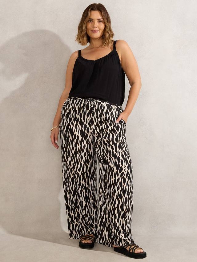 

Широкие брюки с моно-принтом Live Unlimited