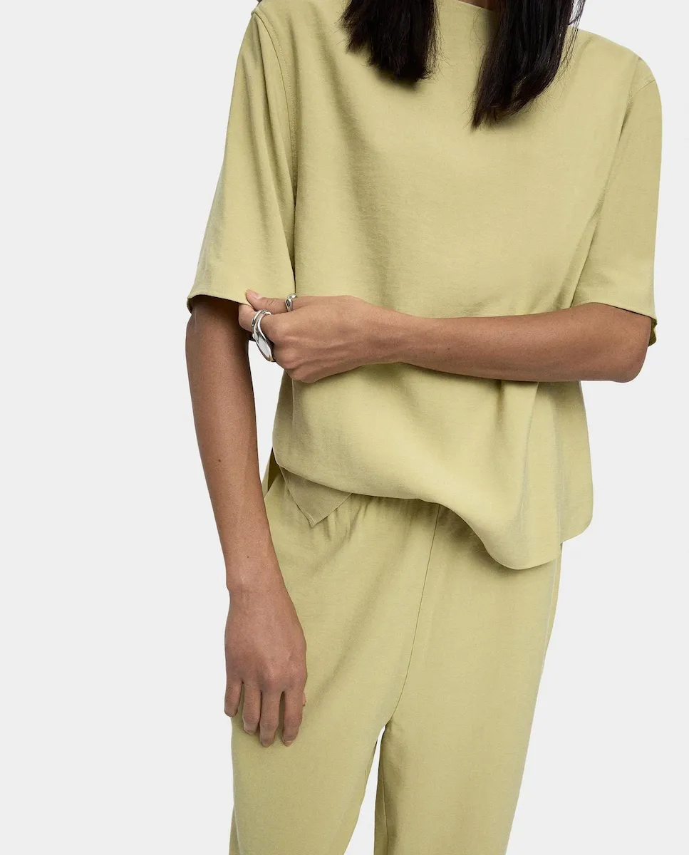 

Женская футболка с коротким рукавом и пуговицами на одном плече Parfois, светло-зеленый