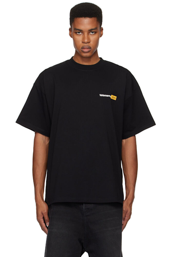 

Черная футболка «Vetements.com»