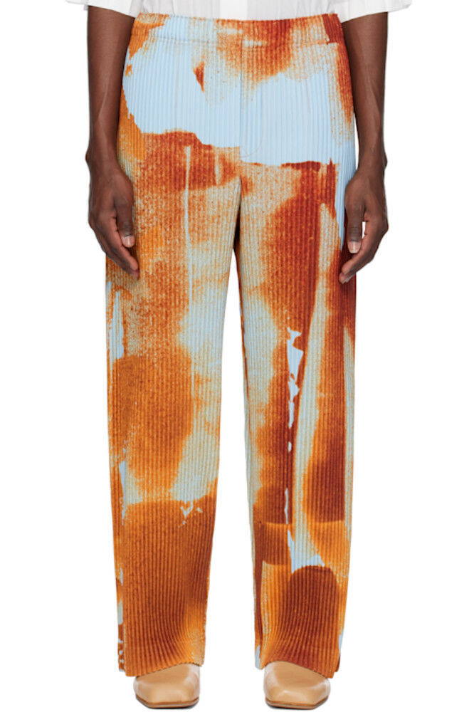 

Оранжевые и синие ветрозащитные брюки HOMME PLISSÉ ISSEY MIYAKE