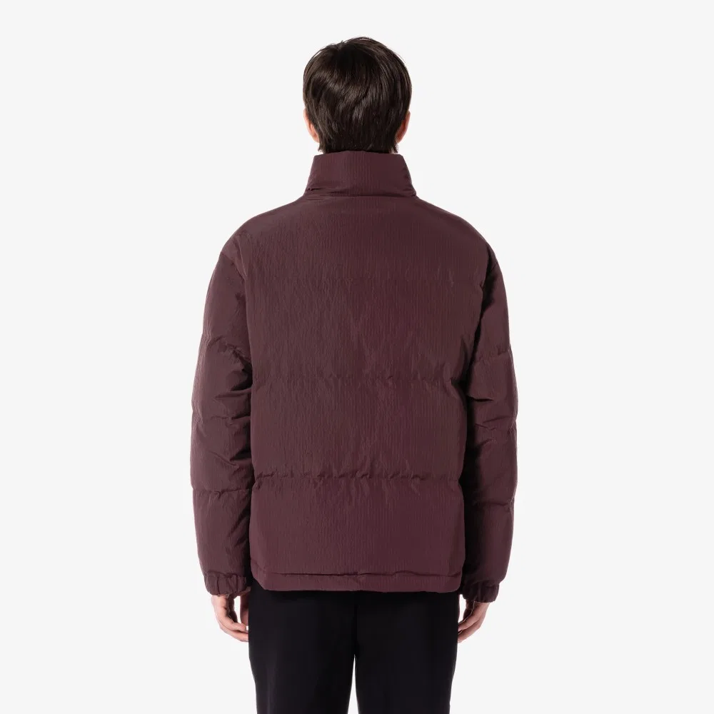 Мужская куртка-пуховик коричневого цвета от Lacoste — фото 2