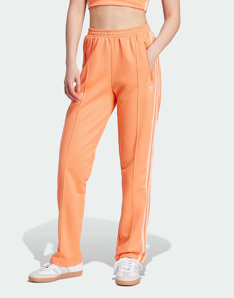 

Спортивные брюки Adidas Originals Classics кораллового цвета