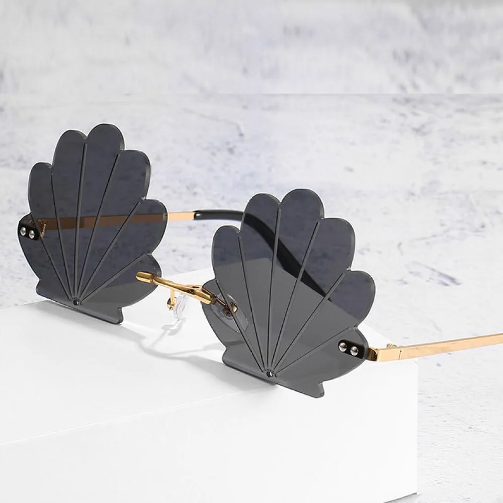 

Модные солнцезащитные очки без оправы в форме цветка для женщин, ретро-стиль, прозрачные линзы с текстурой ракушки, женские солнцезащитные очки MTZJH, Blue Pink