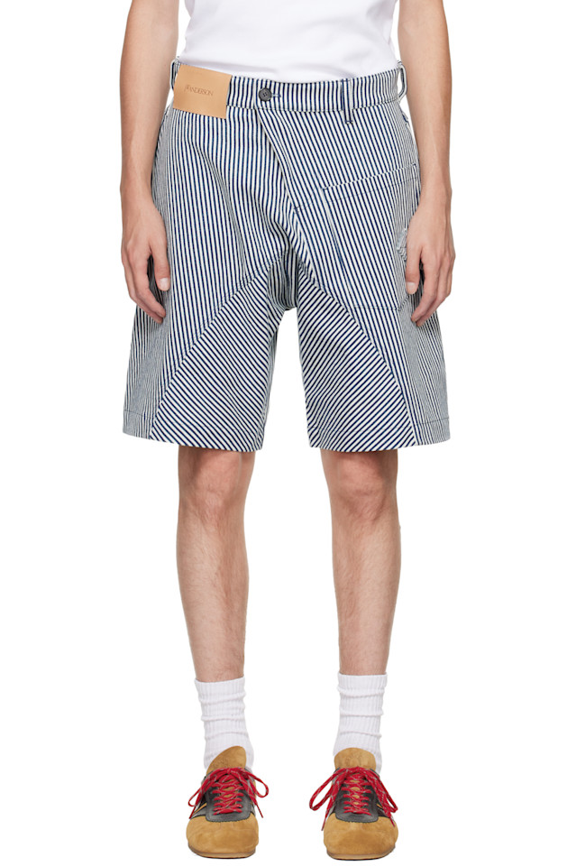 

Jw Anderson Рабочие шорты белого и темно-синего цвета, скрученные в мелкий узор