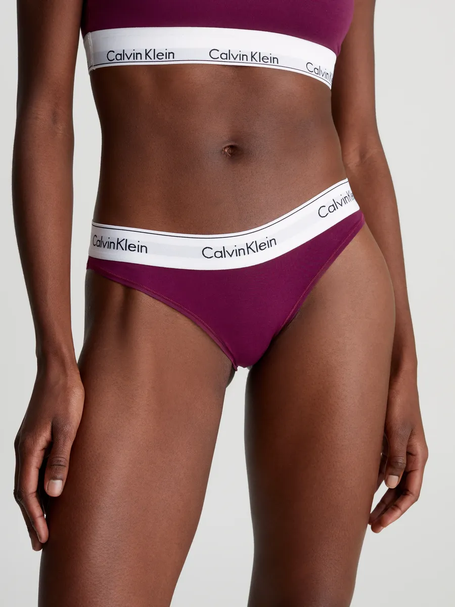 

Трусики бикини Calvin Klein Underwear "BIKINI" с логотипом CK на поясе, цвет Purple Potion