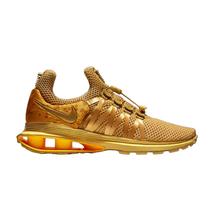 

Кроссовки Nike Wmns Shox Gravity 'Metallic Gold', золотой
