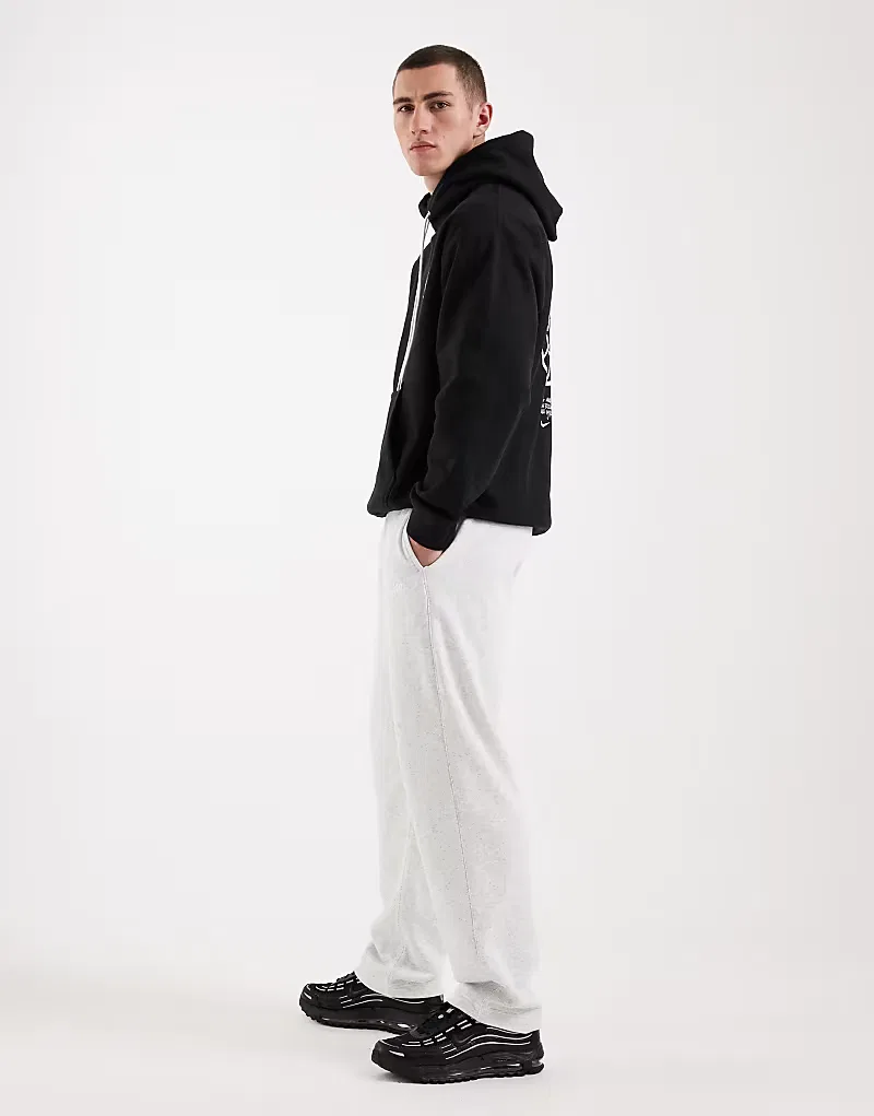 Спортивные брюки Nike Club French Terry с открытым низом, светло-серый — фото 3