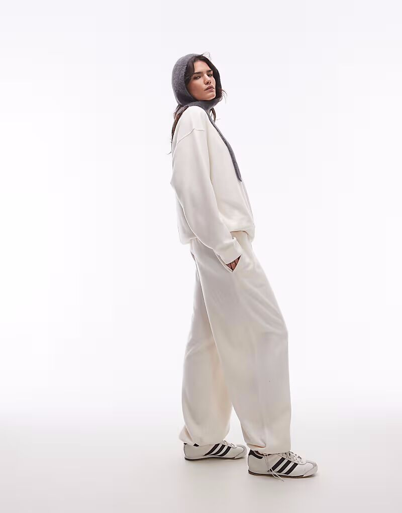 

Брюки-джоггеры с начесом и манжетами кремового цвета Topshop