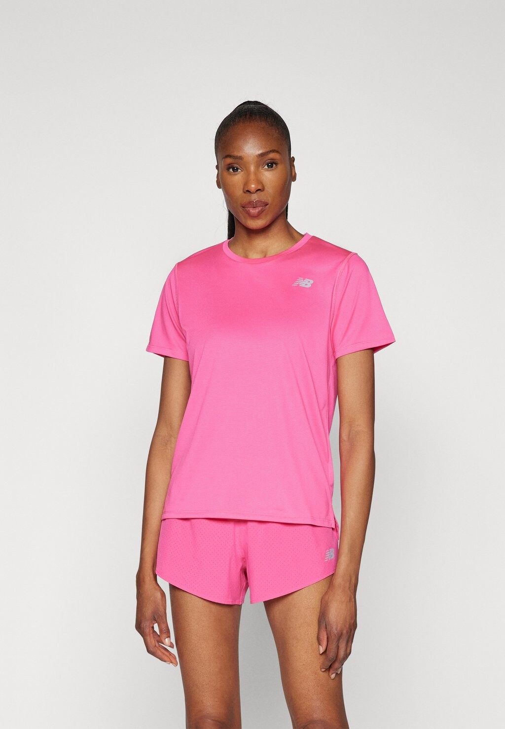 

Спортивная футболка ESSENTIALS New Balance, розовый