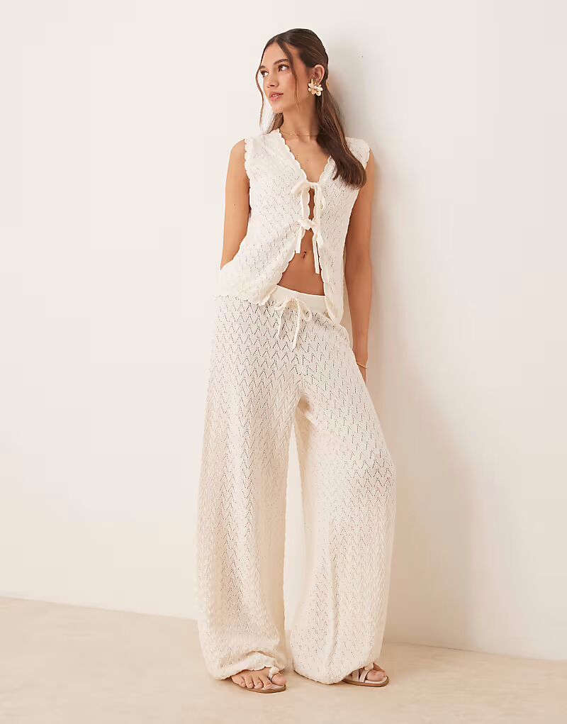 

Трикотажные брюки ASOS DESIGN цвета экрю