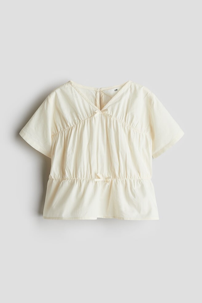 

Хлопковая блузка с баской H&M, бежевый