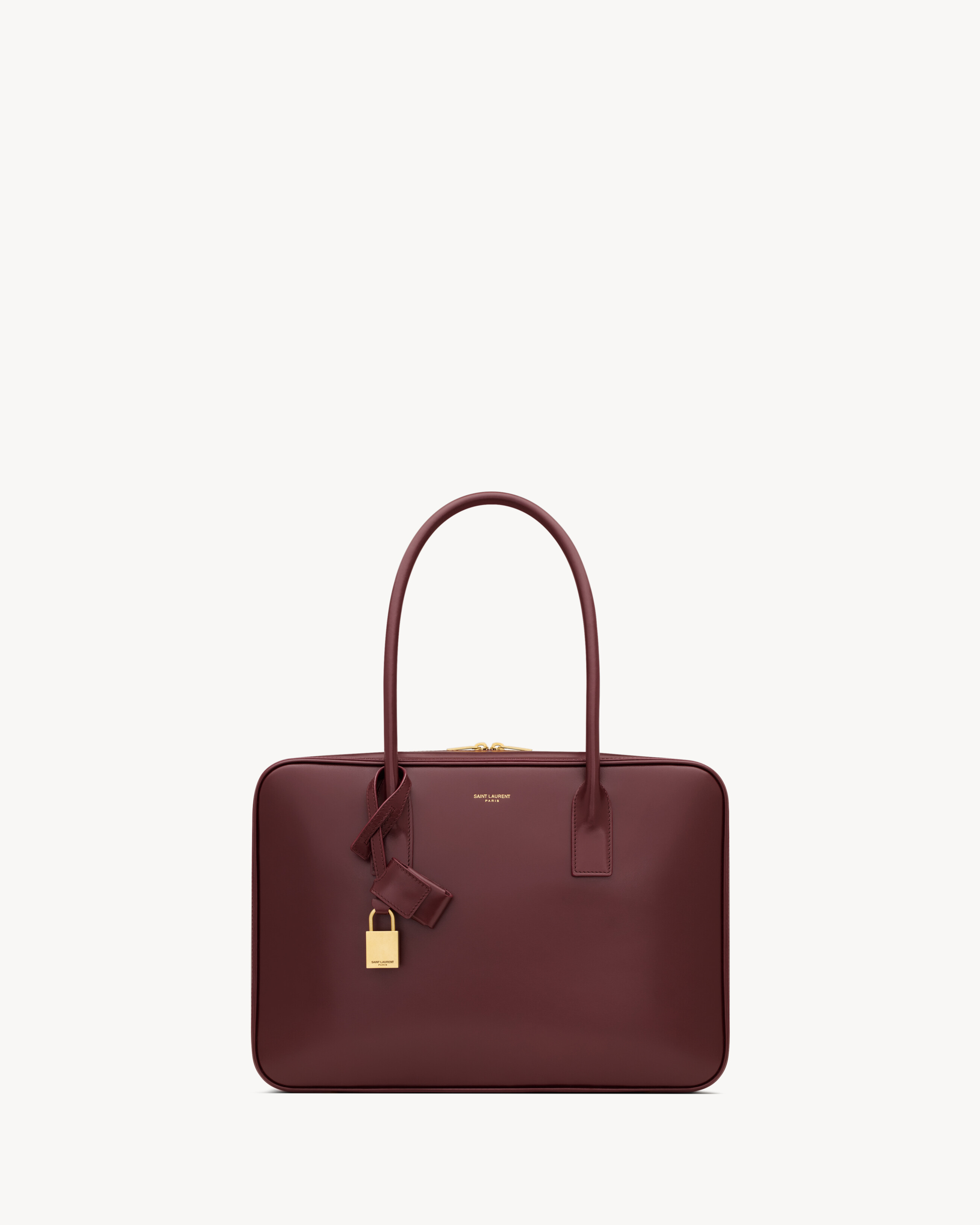 

Сумка SAC DE JOUR в форме баулетто из кожи BOX SAINT LAURENT, красный