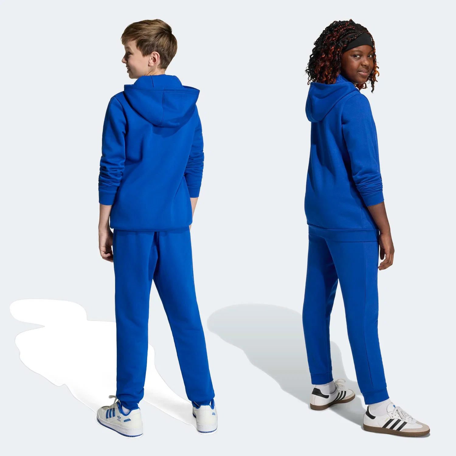 Зауженные брюки Adidas Originals Trefoil Essentials темно-синего цвета — фото 4