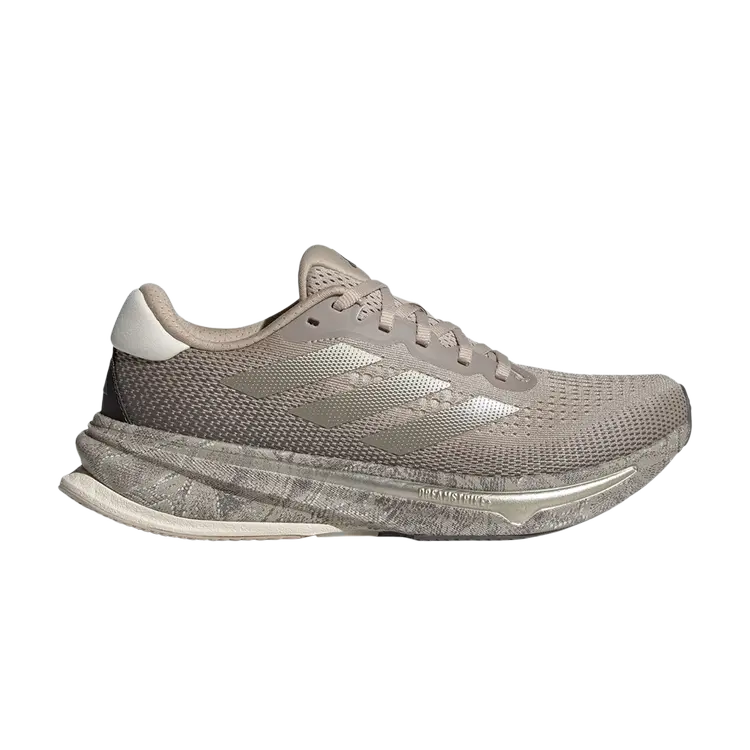 

Кроссовки Wmns Supernova Rise, цвет Wonder Beige Snake