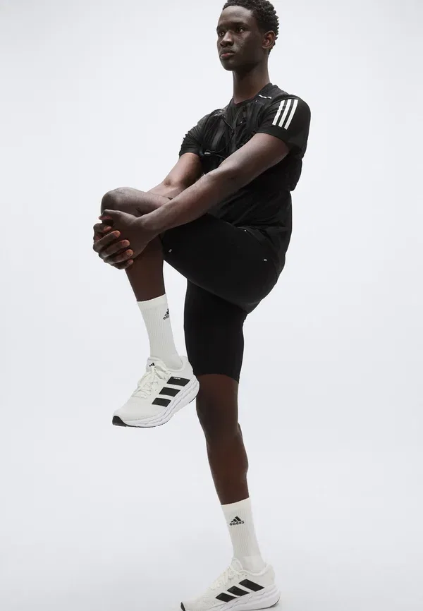 Короткие беговые леггинсы Adidas Performance, черный — фото 4