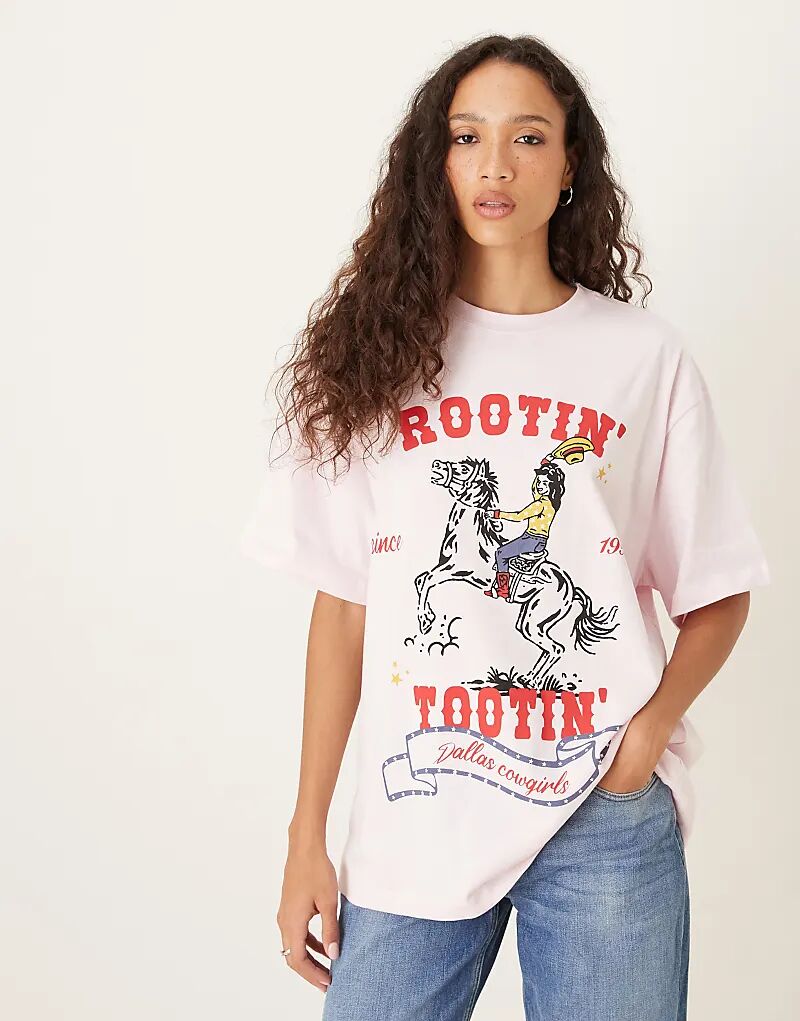 

Футболка ASOS DESIGN оверсайз с принтом девушки-ковбоя в стиле Далласа светло-розового цвета