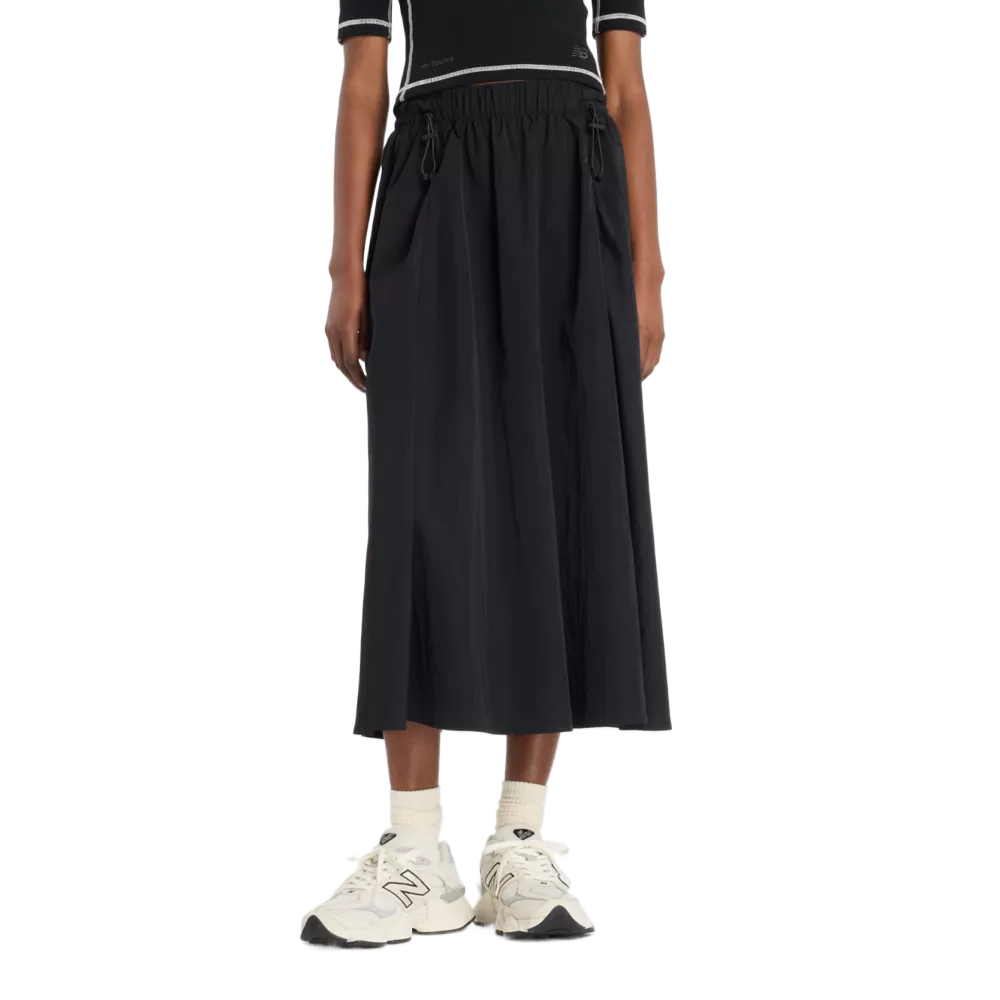

Серая повседневная длинная юбка NB для женщин New Balance, черный