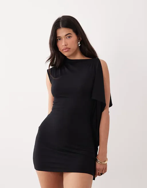 

Черное платье-кейп с одним рукавом и литой пуговицей ASOS DESIGN