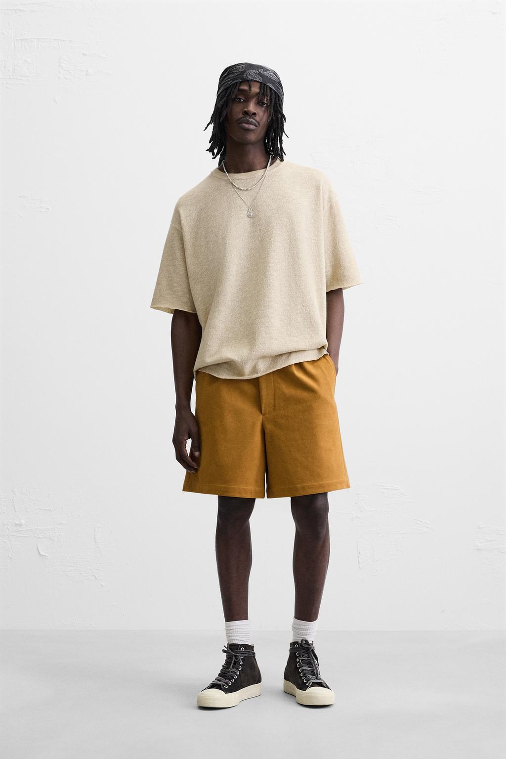 

Трикотажная футболка с текстурированным принтом ZARA, экрю