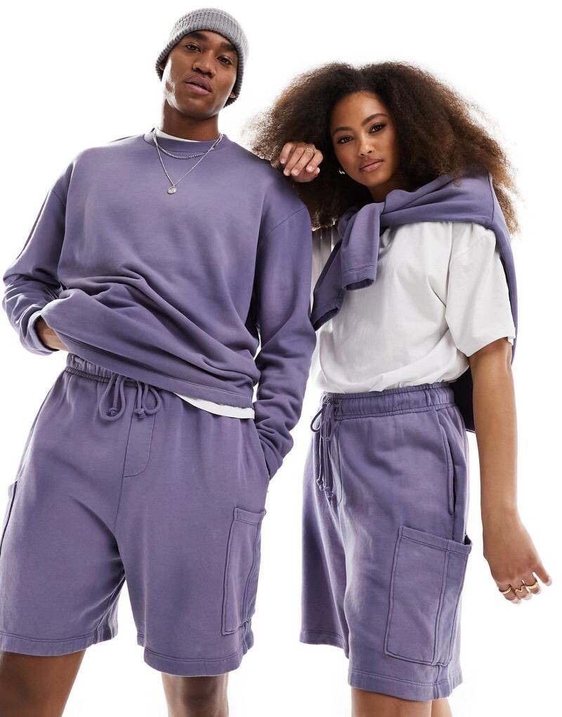 

Розовые шорты унисекс с карманом-карго ASOS DESIGN — часть комплекта