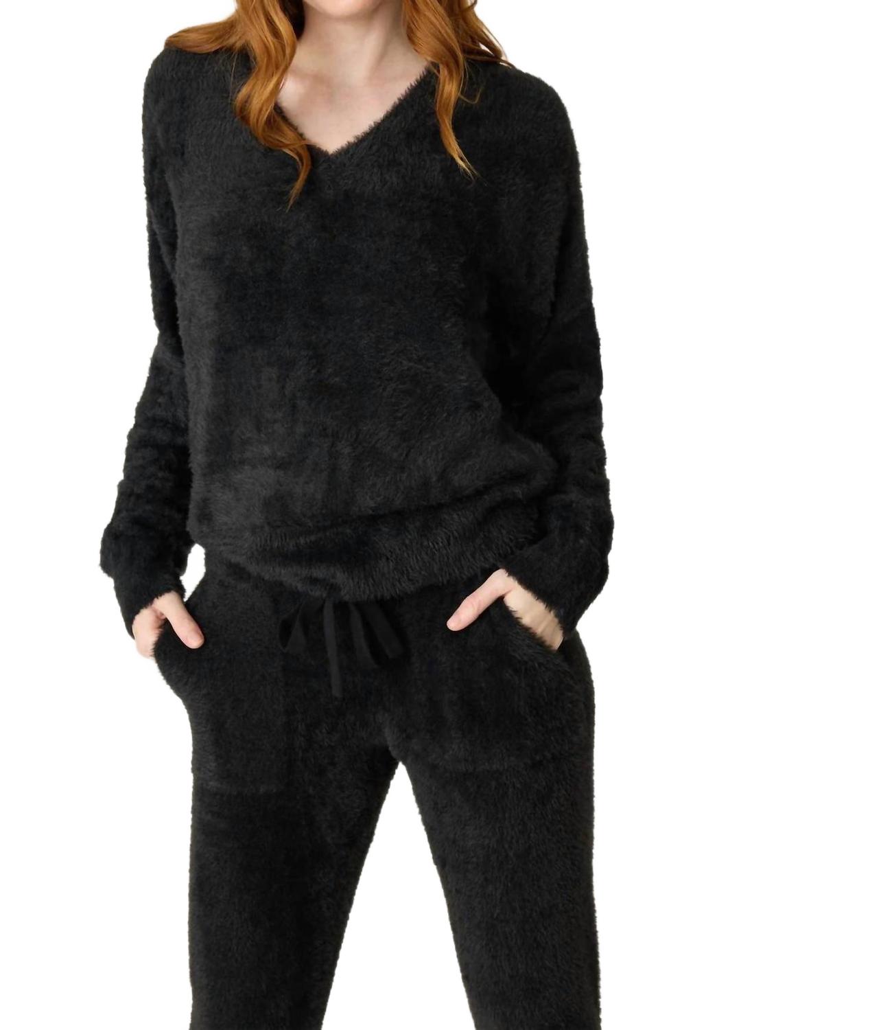 

Уютный и стильный вязаный топ с перьями и длинными рукавами в черном цвете PJ Salvage