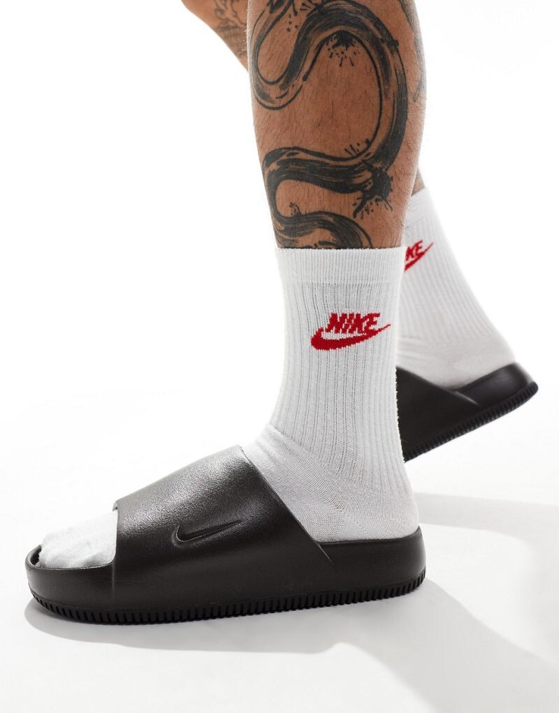 

Черные бархатные шлепанцы Nike Calm