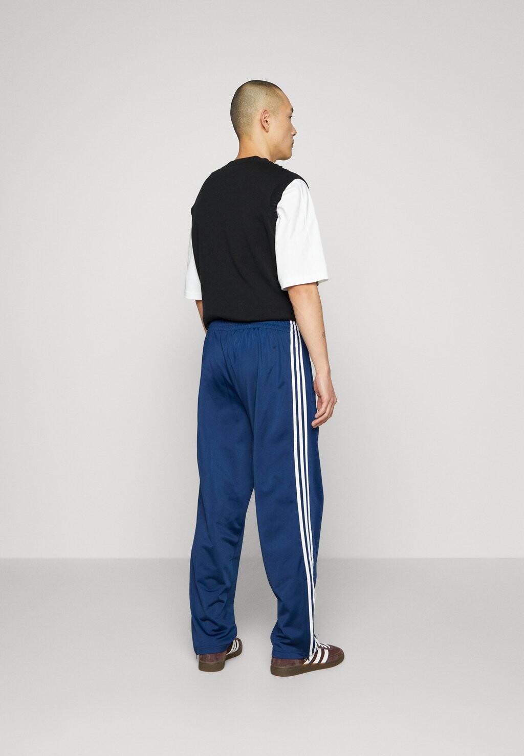

Спортивные брюки Firebird adidas Originals, темно-синий